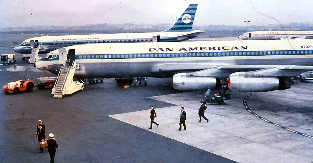 Pan Am B707 and Qantas B707 on the ground at Singapore, 1966